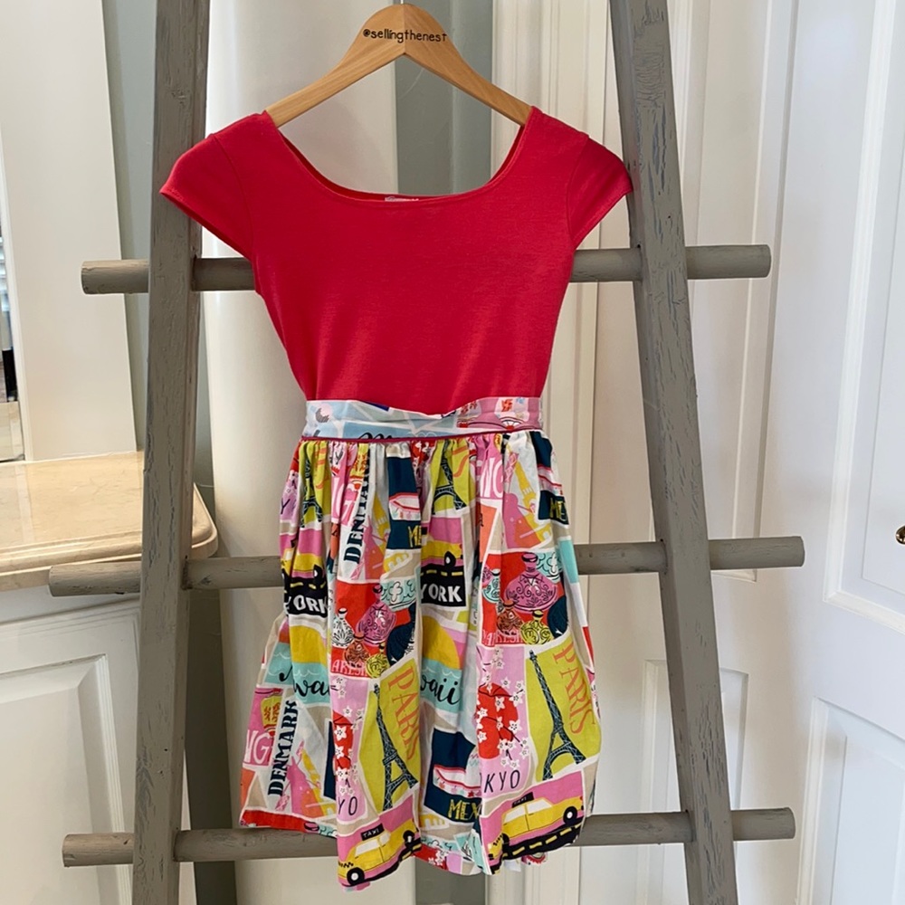 Girls dress with bright print skirt